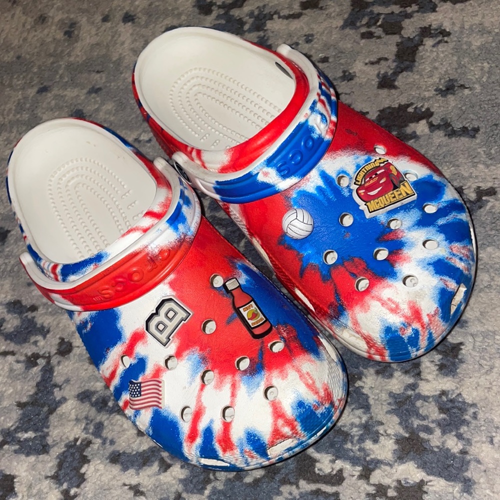 Red white and blue tie dye crocs + jibbitz